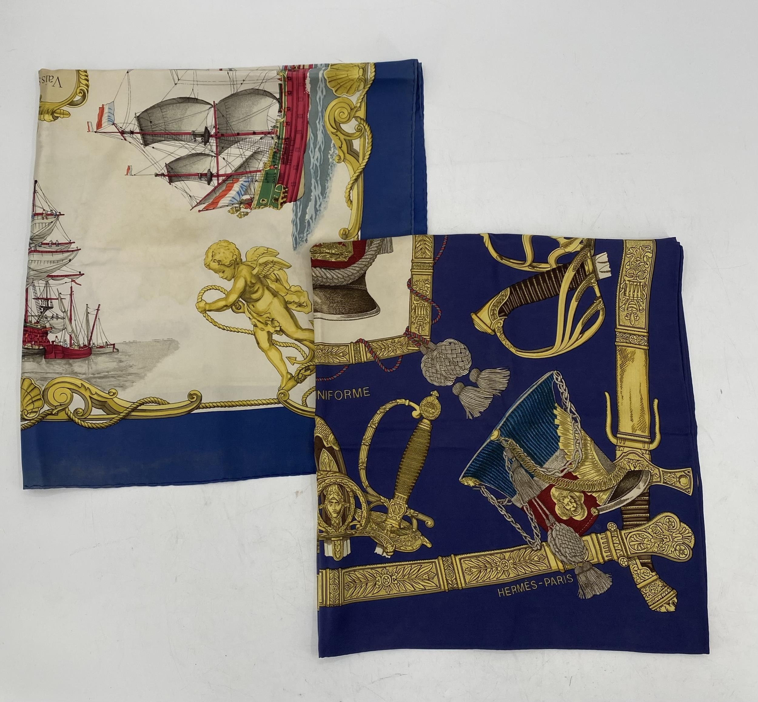 Two Hermes scarves, Grande Uniforme, small staining in cream and tiny pin hole in centre; and