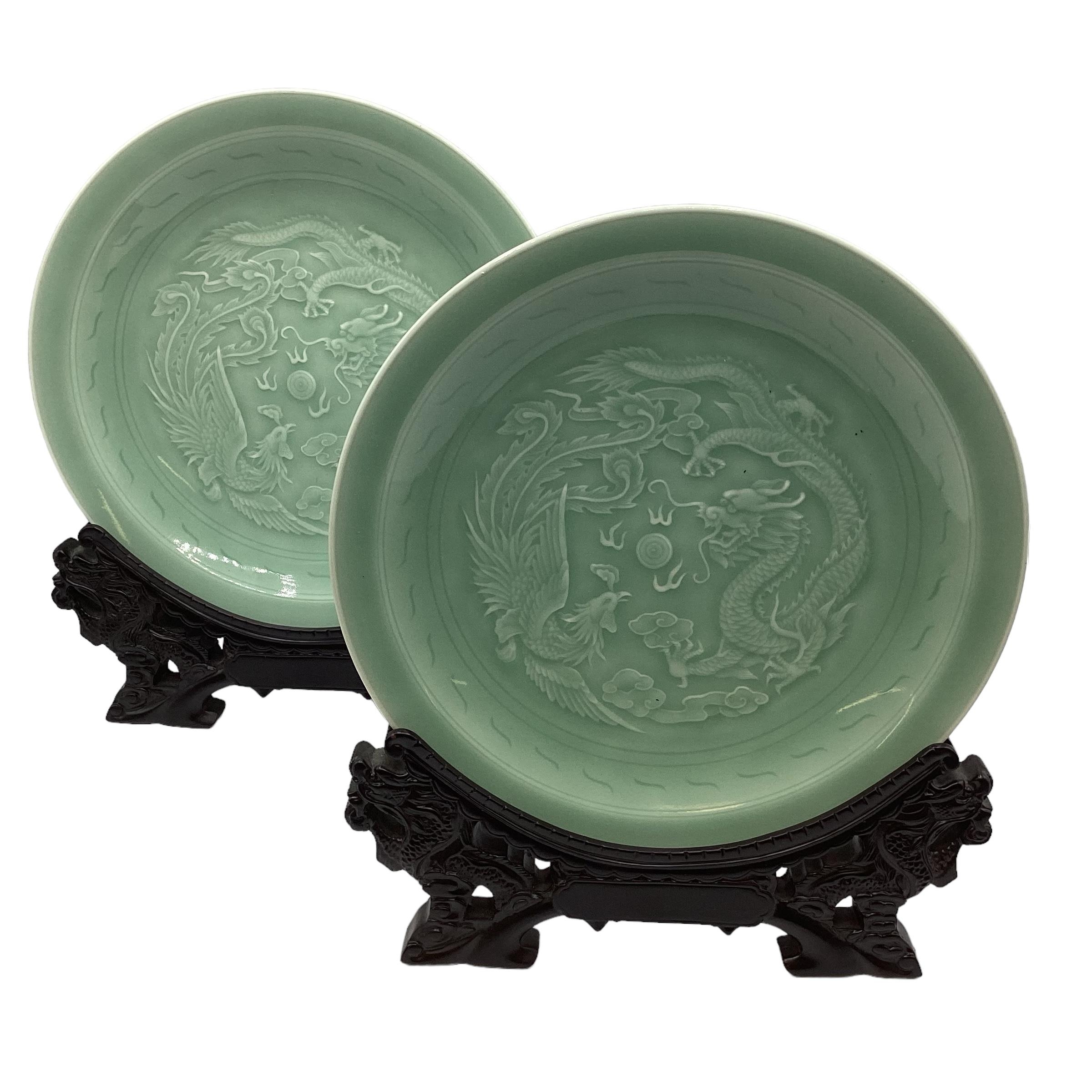 Two Chinese celadon chargers in presentation boxes stylised phoenix and dragon decoration with - Image 5 of 10