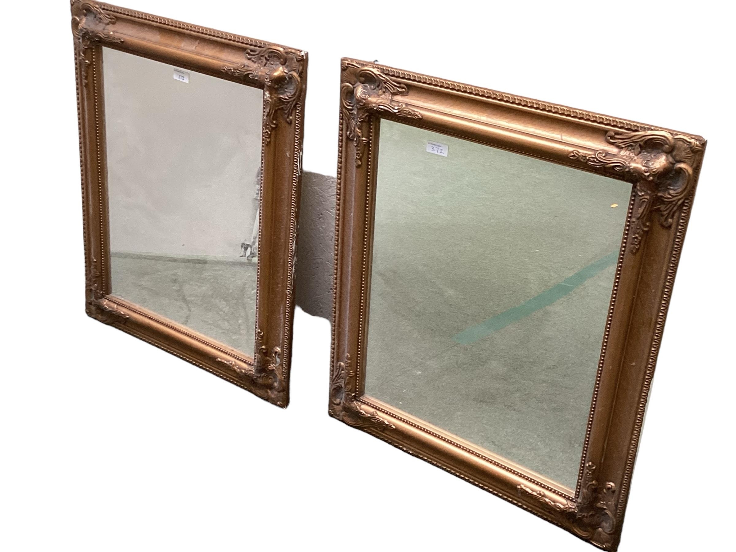 A pair of decorative wall mirrors, country house hotel clearance, all functional and with little