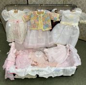 A quantity of very good quality hand made baby girls clothes, mainly dresses, with bloomers etc