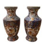 Pair of Vases in the Imari palette, some minor wear to gilding, 38cm H