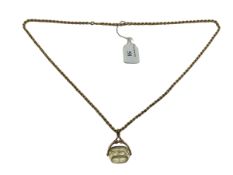 A 9ct gold rope twist necklace. 82cm, 20.53g. Together with a 9ct gold mounted citrine swivel