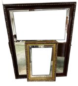 A modern large wooden and gilt patterned framed wall mirror, and another small gilt framed style