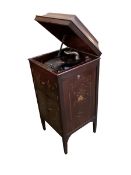 A tall free standing chinoisserie laquer gramaphone, dark red