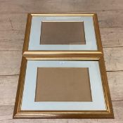 A pair of modern gilt glazed frames, empty, overall 52cm x 86cm W