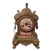 A late C19th porcelain and gilt metal mantel clock, 29cmH