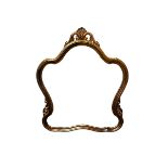 A modern gilt frame wall mirror, with curved shaped surround and foliate design to each side and