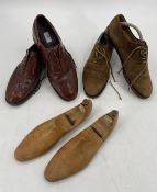Two pairs of mens shoes: brown suede lace ups (with wear) and brown leather lace ups (with wear)