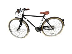 A vintage bicycle, DAWES, "Dawes Cycle Heritage" label to pole