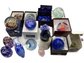 A quantity of glass paperweights, to include Caithness, Isle of Wight, Gleneagles Crystal,