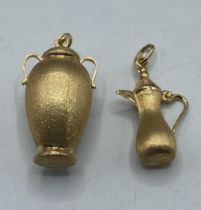 Two 18ct gold Middle Eastern charms. 6.8g