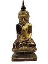 A late 19th early 20th century Shan style Burmese carved wooden figure of a seated Buddha Dhyana