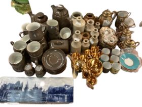 A quantity of china to include DENBY, Noritake, Limogue Legle Coffee cans, Stoneware coffee cans etc
