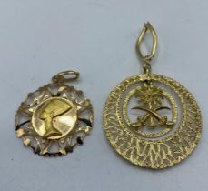 Two 18ct gold middle eastern style pendants. 10.65g