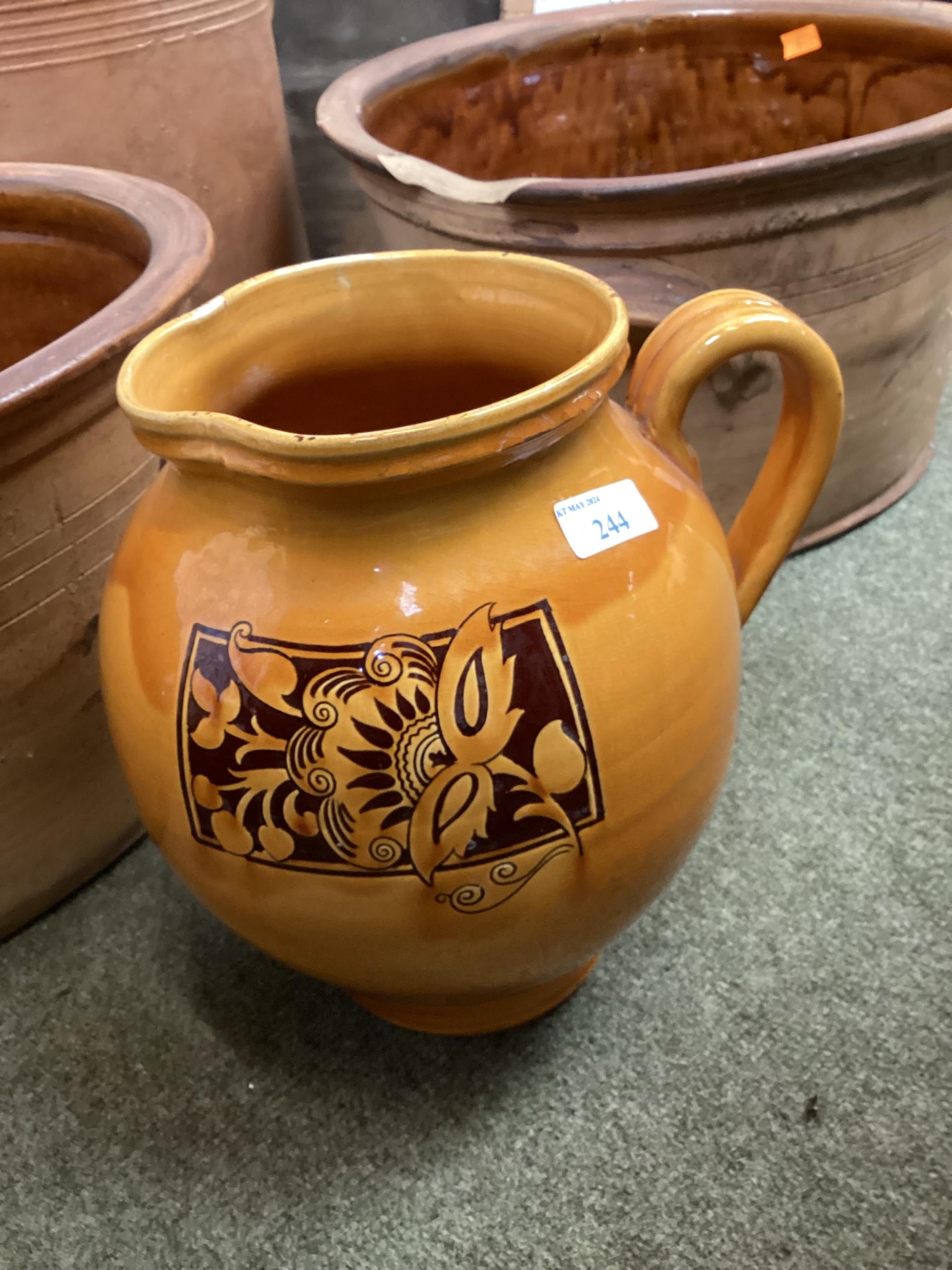 A pottery yellow ochre jug, and other earthenware vases, jugs, a lidded crock and two large bowls, - Image 4 of 6