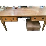 A large pine table, with two drawers to one long side, 198cm Long x 90cm Wide x 76cm H, general wear