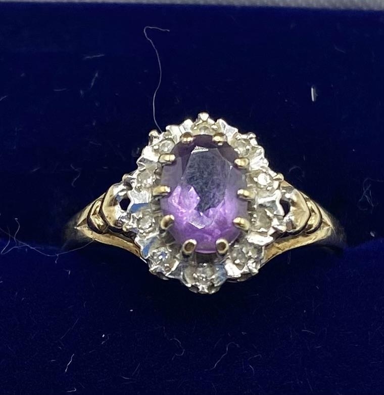 A 9ct gold amethyst and diamond ring. Central oval free cut amethyst with a surround of illusion set - Image 2 of 5