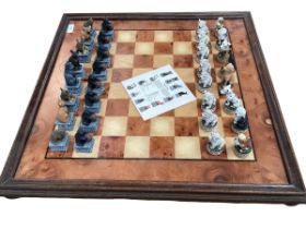 A modern Chess board with novel cat and dog chess pieces