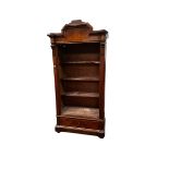 A large bookcase, with raised arched pediment 216H x 100cm, as found