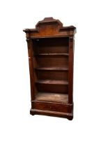 A large bookcase, with raised arched pediment 216H x 100cm, as found