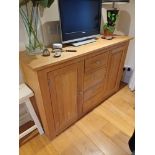 A modern wooden side cabinet, 4 central drawers flanked by 2 cupboard doors, 148cm W (matching 508)