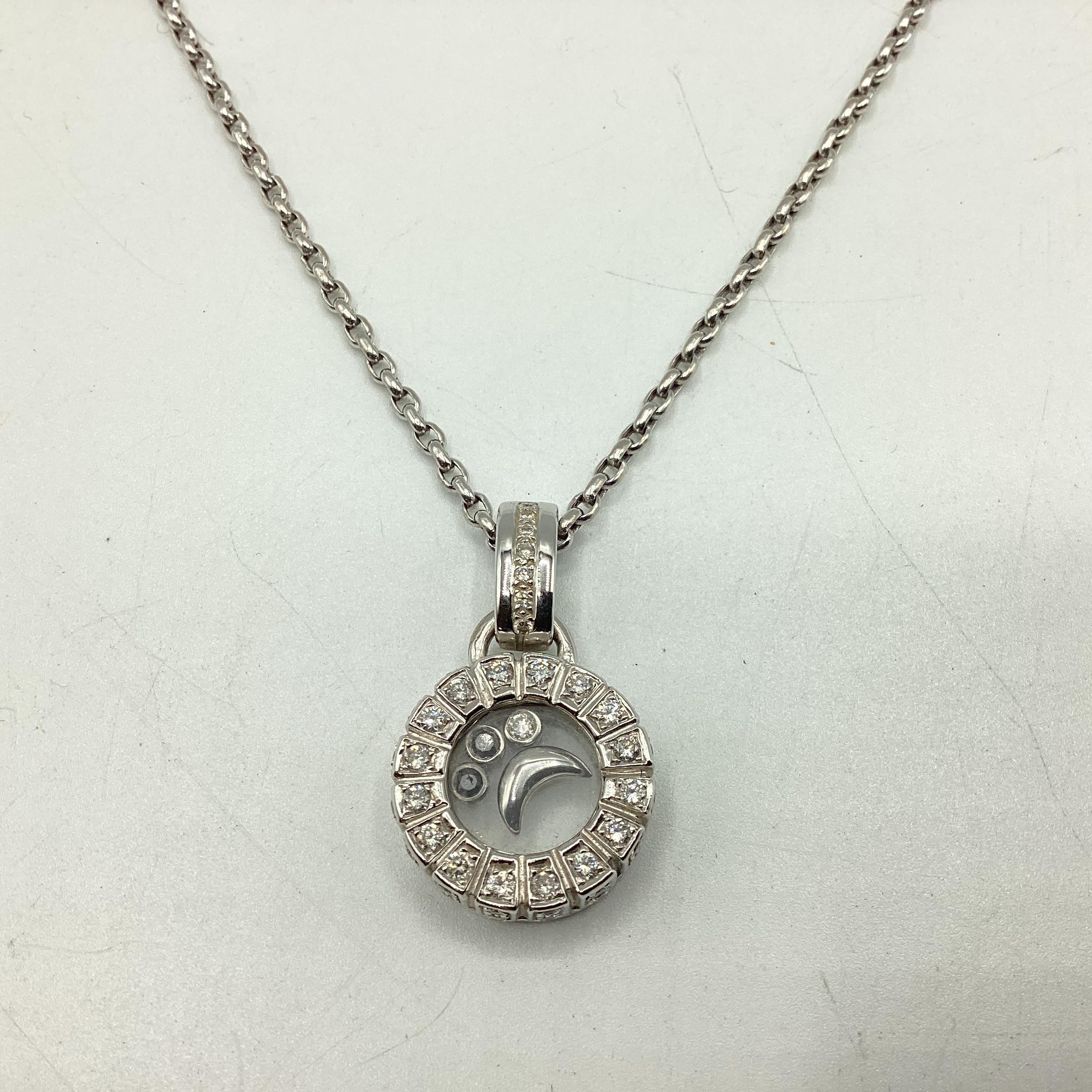 An 18ct white gold and diamond pendant in the Choppard style. Circular diamond set pendant with - Image 2 of 5