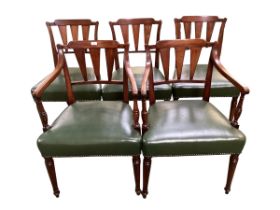 A set of 5 dining chairs with green leather buttoned seats, including two carvers, all in good