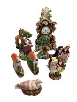A Porcelain clock and a collection of Staffordshire figures, including a pair of greyhounds, 16cm H,