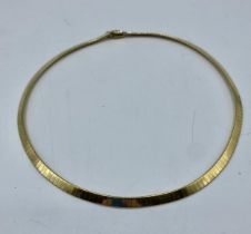 An 18ct gold flat fancy link necklace. 42cm. 32g.