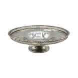 A Sterling silver circular footed bowl with pierced gallery, Goldsmiths & Silversmiths Co London,