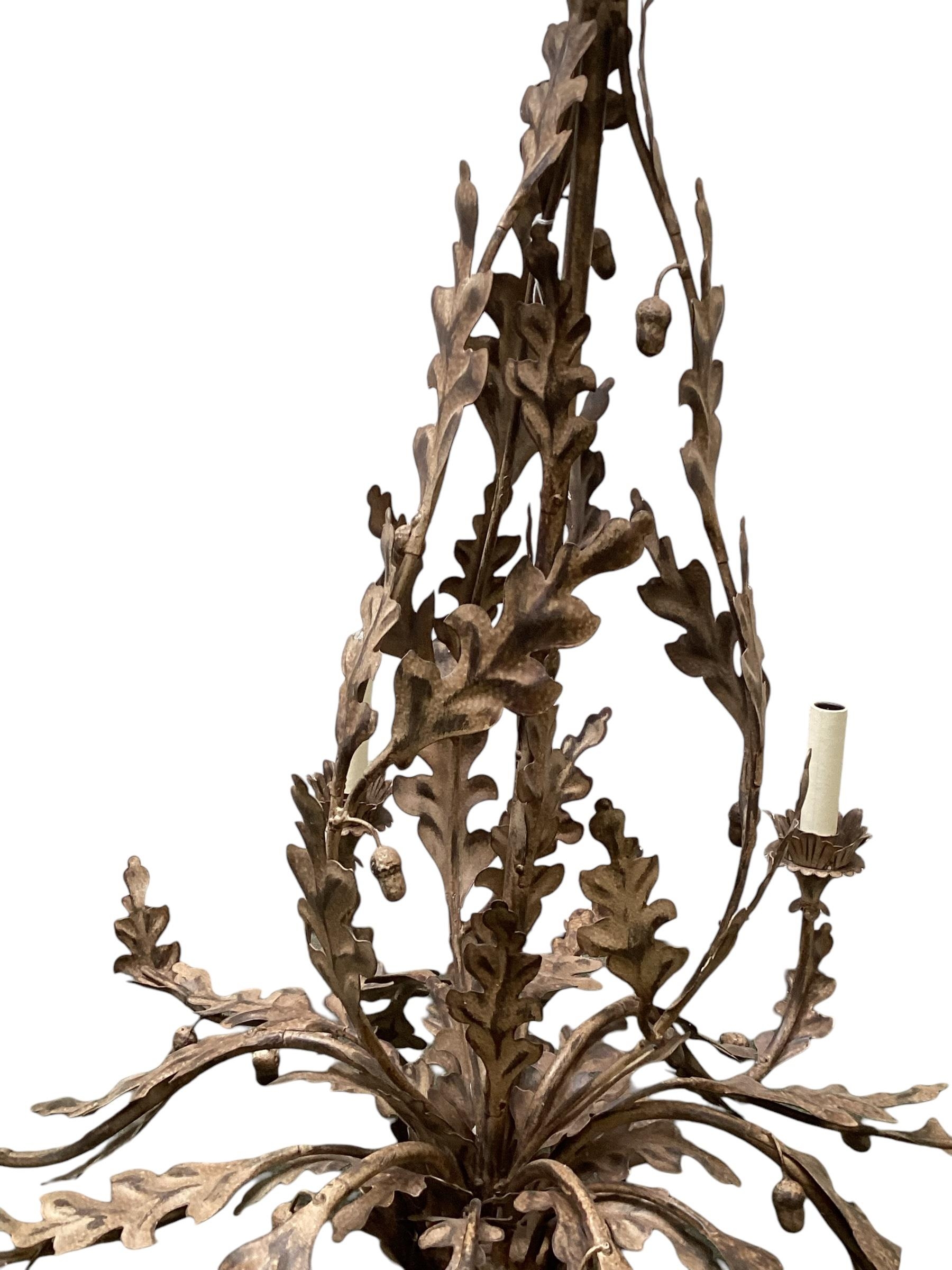 A contemporary decorative light metal six branch chandelier, with ornate leaf decoration and finial, - Image 5 of 6