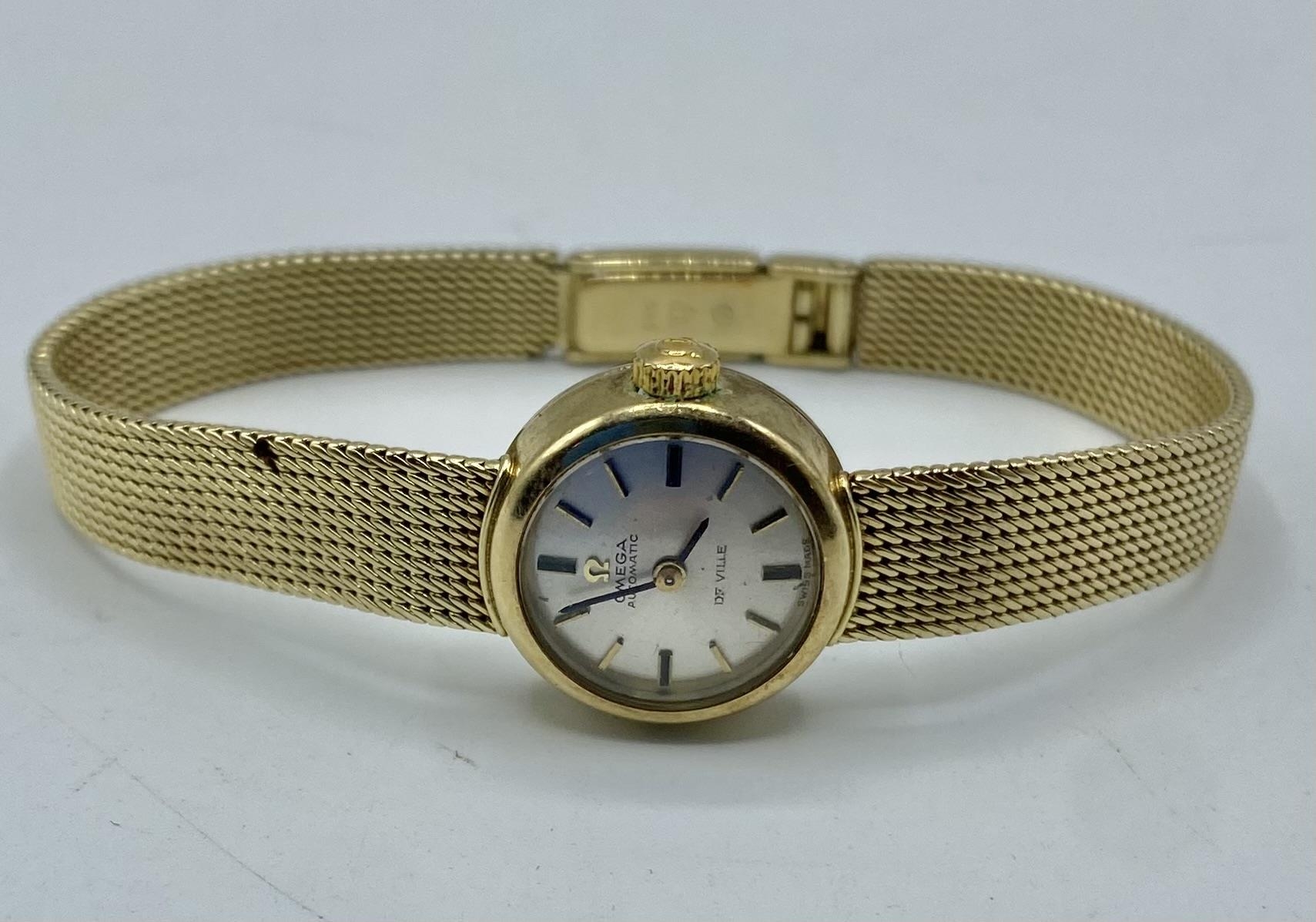 A 9ct gold cased Omega automatic deVille on a 14ct gold bracelet strap. 25g.