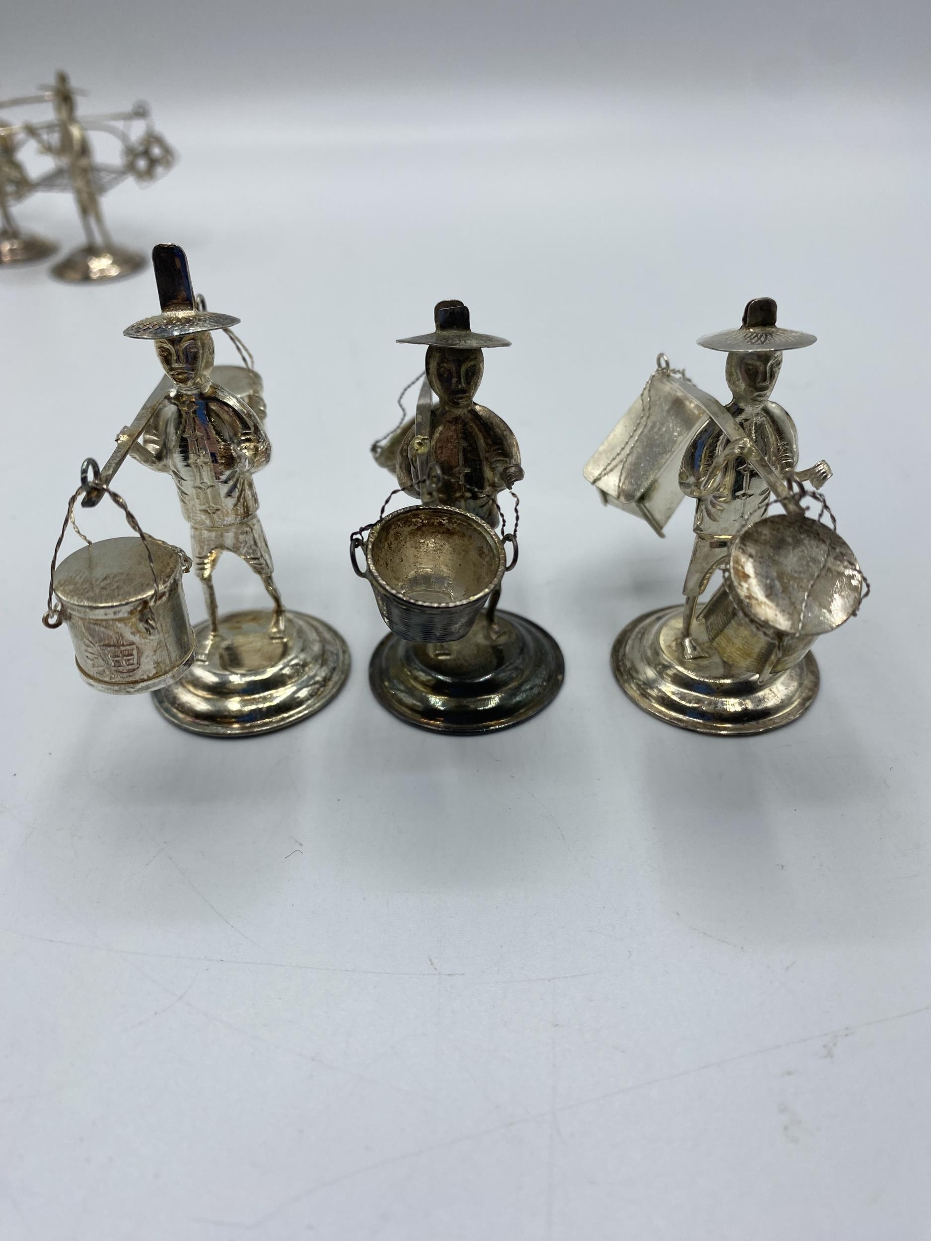 A set of 10 Hong Kong Sterling silver figures of gentlemen carrying baskets. together with a - Image 4 of 10