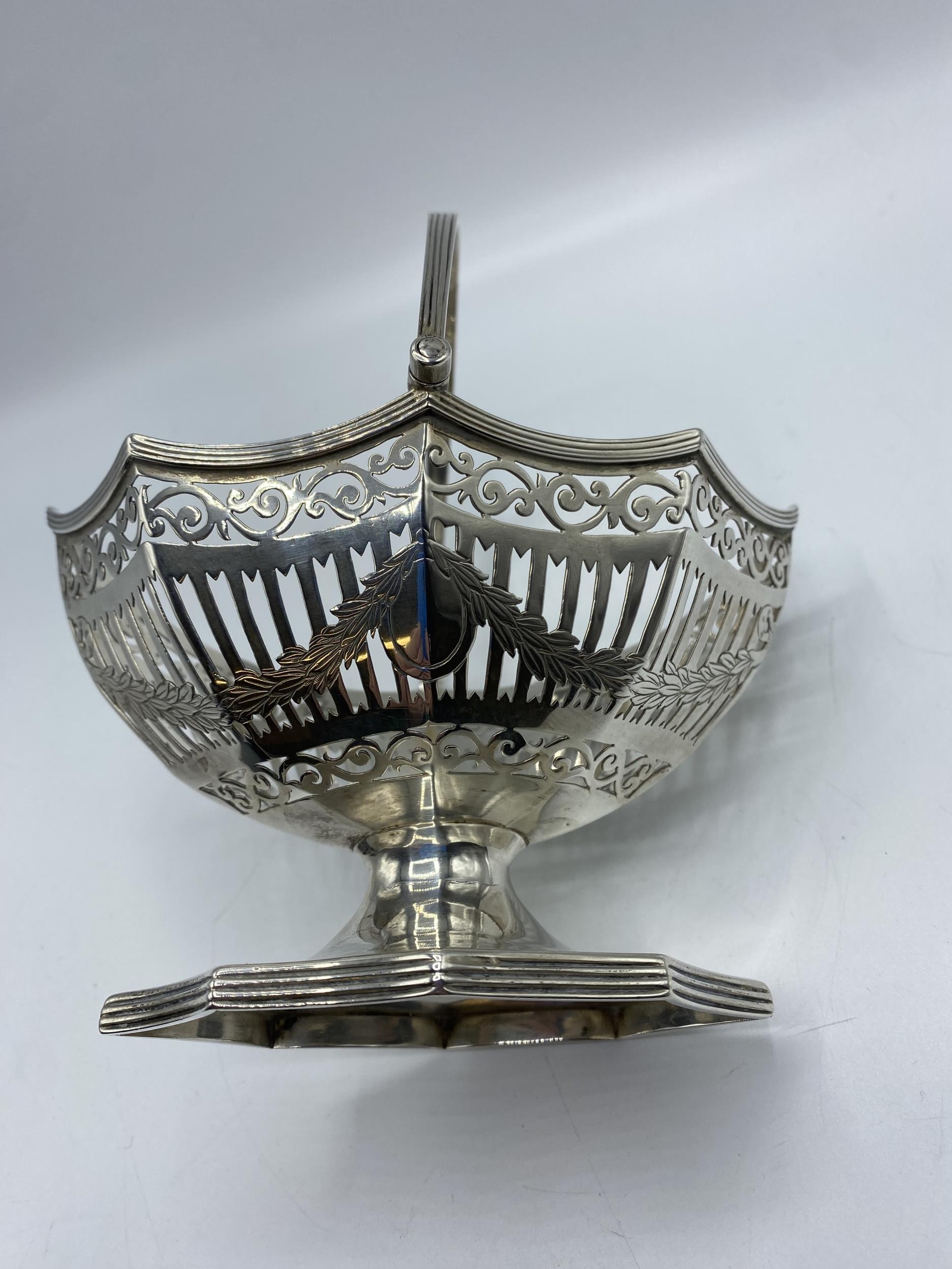 A sterling silver octagonal pierced Bonbon dish with swing handle, by Haseler and Bill, London - Image 2 of 4