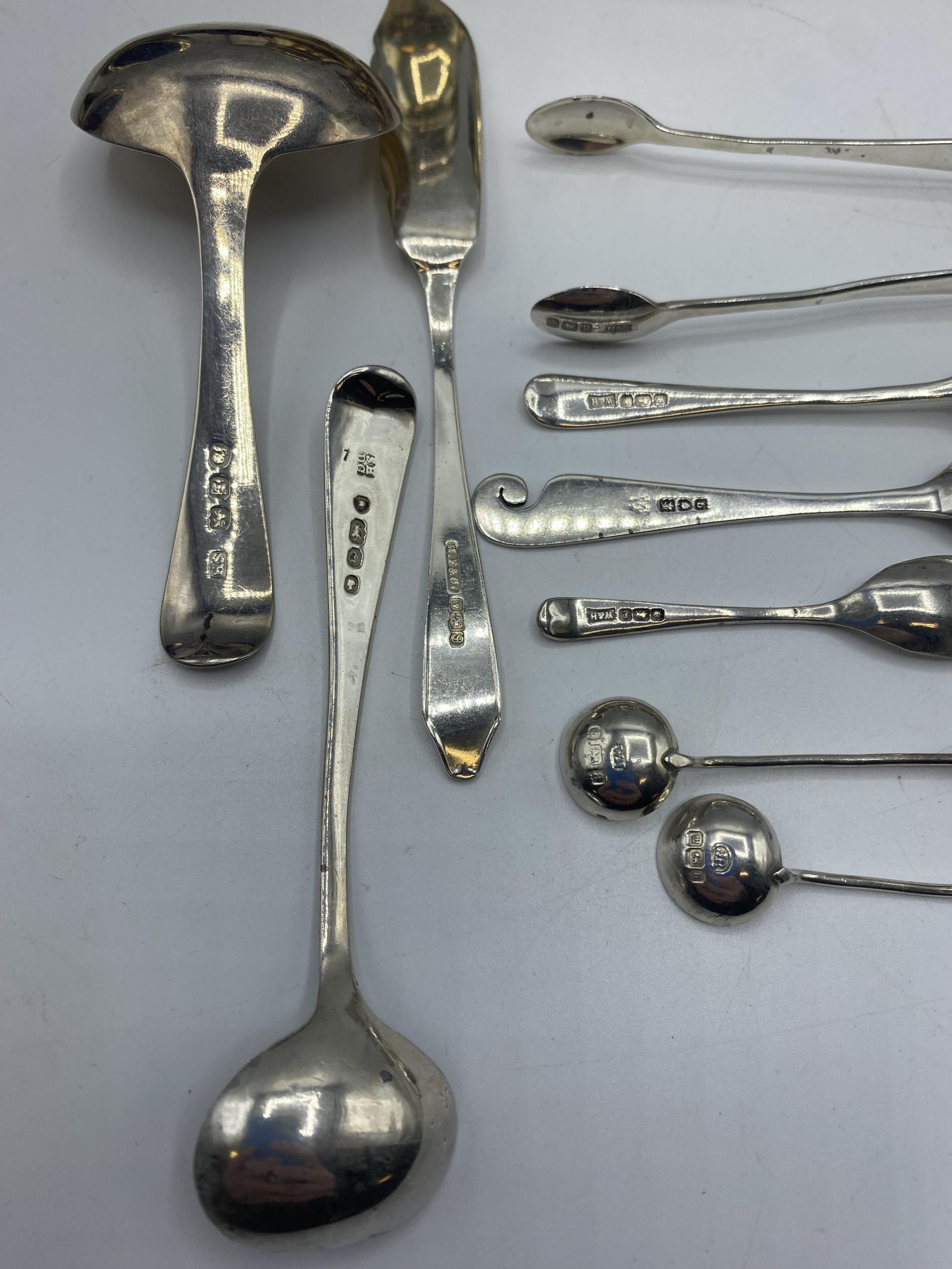 A collection of sterling silver items to include napkin rings , picture frames condiments etc. Gross - Image 11 of 15