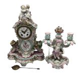 A Meissen clock on stand, and a two branch candleholder, 22cmH,
