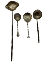 An unmarked white metal coin set toddy ladle with twisted horn/bone handle together with another