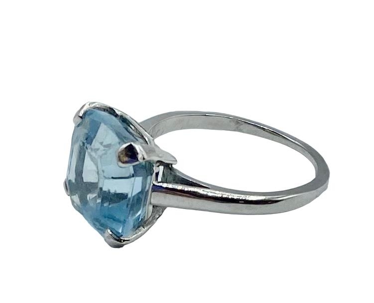 Cartier. Aquamarine and platinum dress ring. Single asscher cut aquamarine, to a four claw