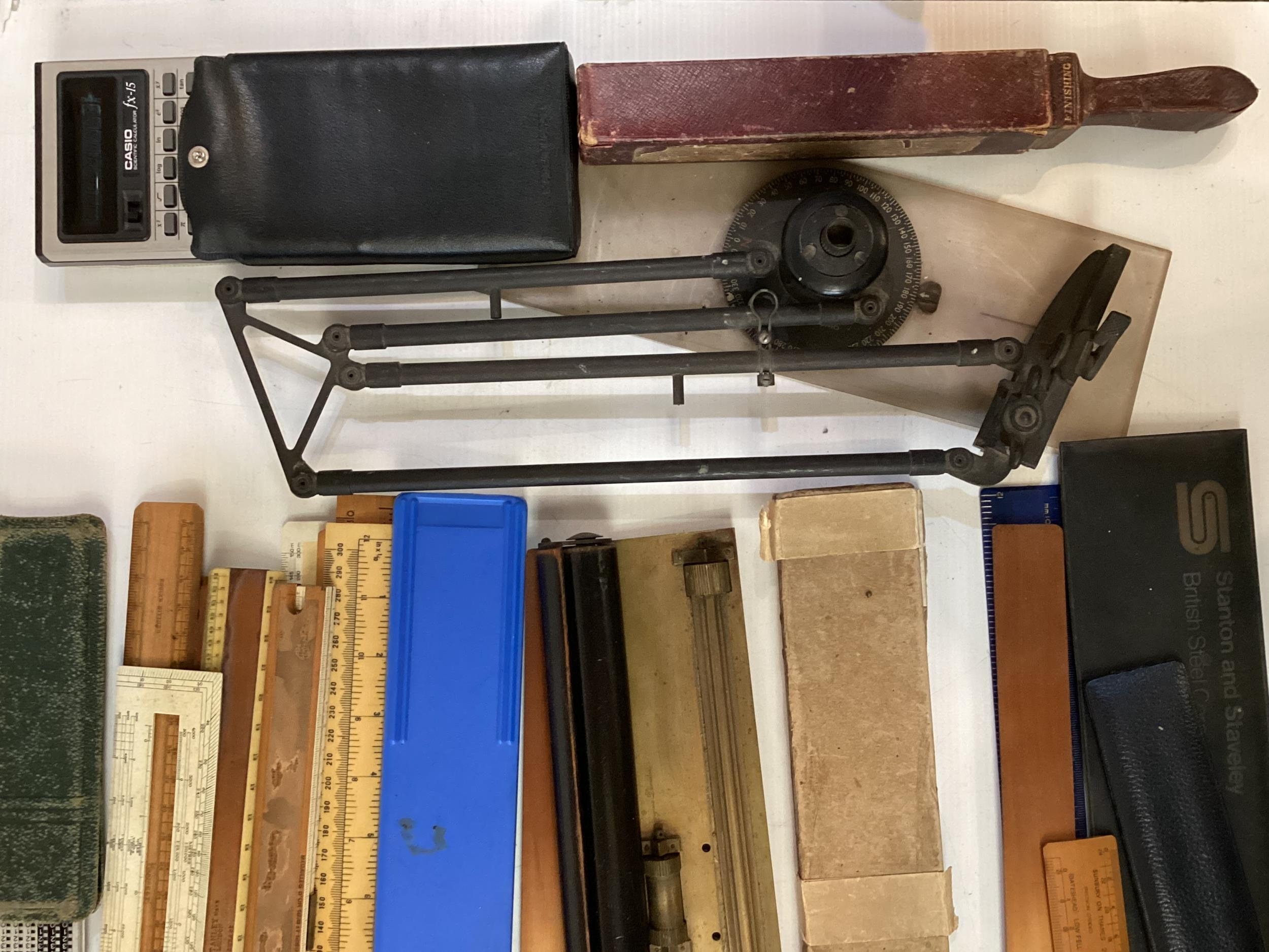 A quantity of drawing instruments, rulers, boxes, and all as found, see images - Image 4 of 4