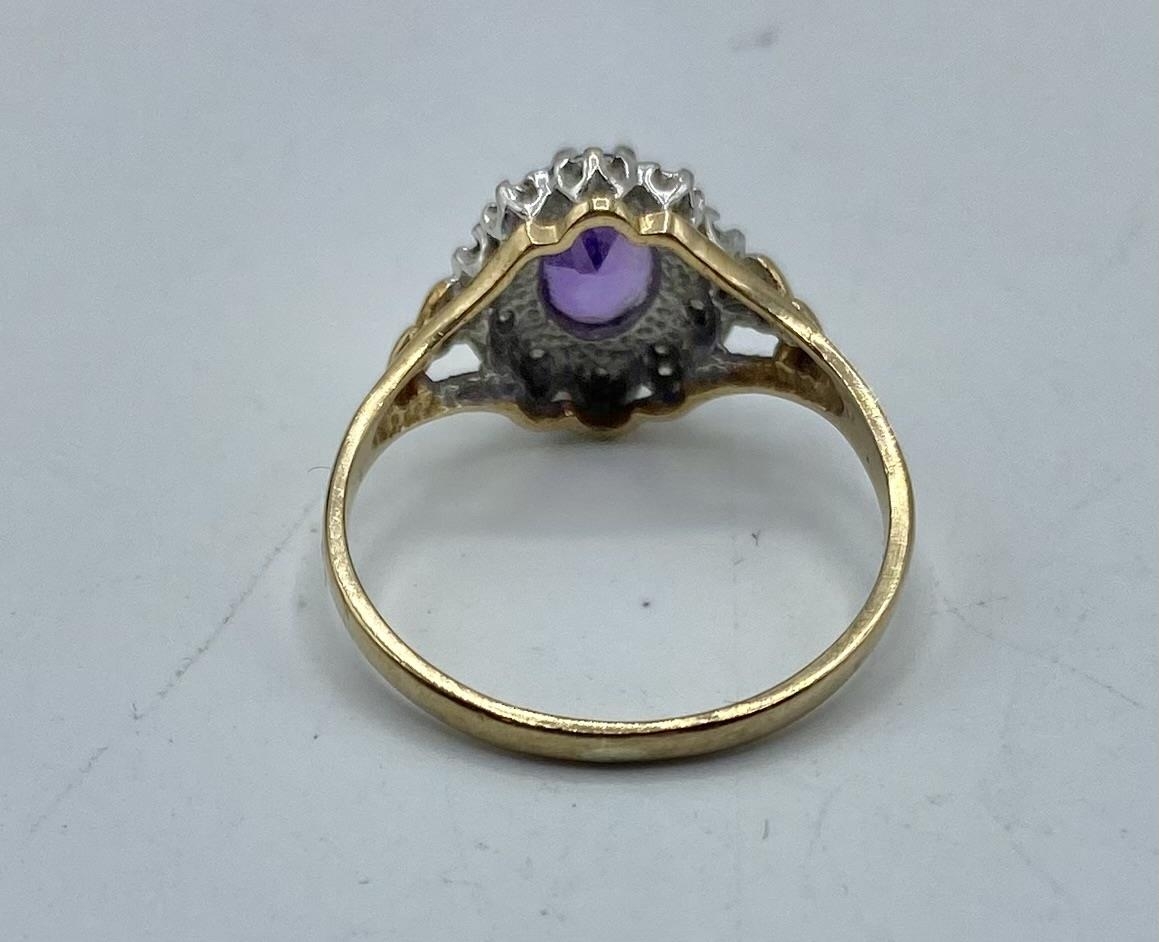 A 9ct gold amethyst and diamond ring. Central oval free cut amethyst with a surround of illusion set - Image 3 of 5