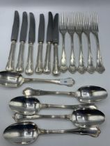 A collection of continental 800 marked silver flatware and knives. Flatware 646g.