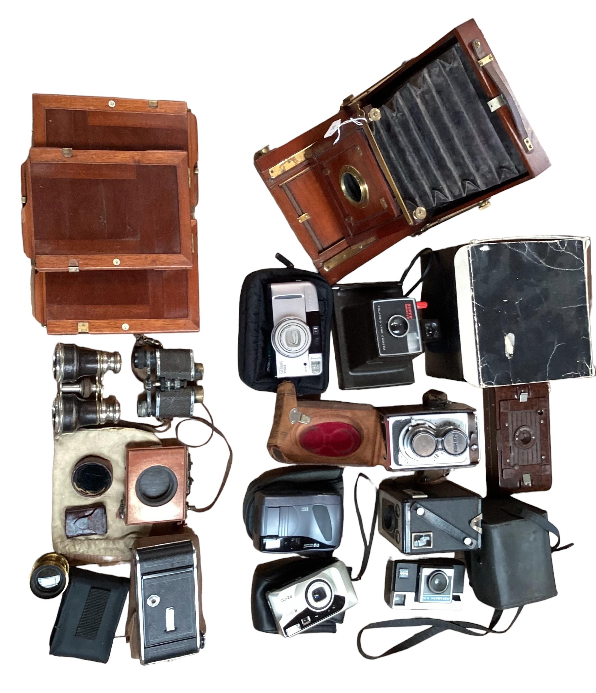 A quantity of vintage cameras including a Marion & Co, 22 & 23 Soho Square, London W, see images