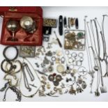 A collection of silver, unmarked white metal and costume jewellery.