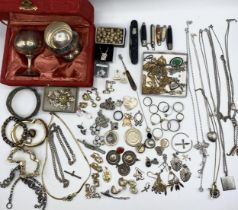 A collection of silver, unmarked white metal and costume jewellery.