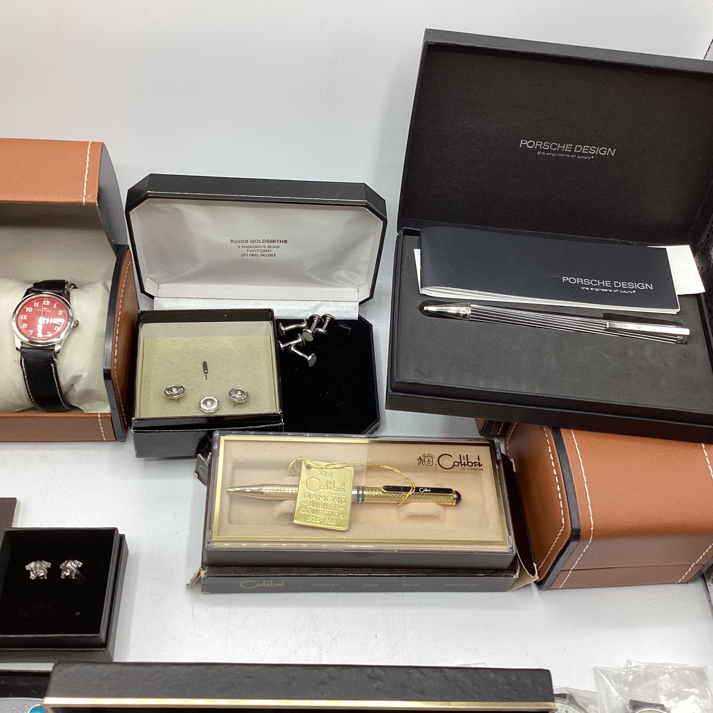 A collection of boxed High Street fashion watches , zippo lighters fountain pens etc. - Image 4 of 6