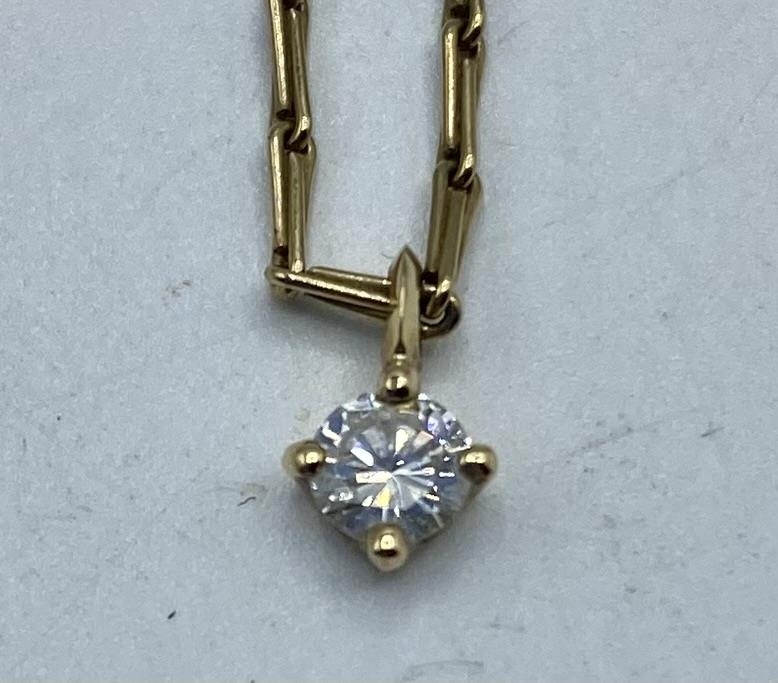 A single stone diamond set pendant on a 9ct gold fancy link necklace. 3.06g. - Image 2 of 2