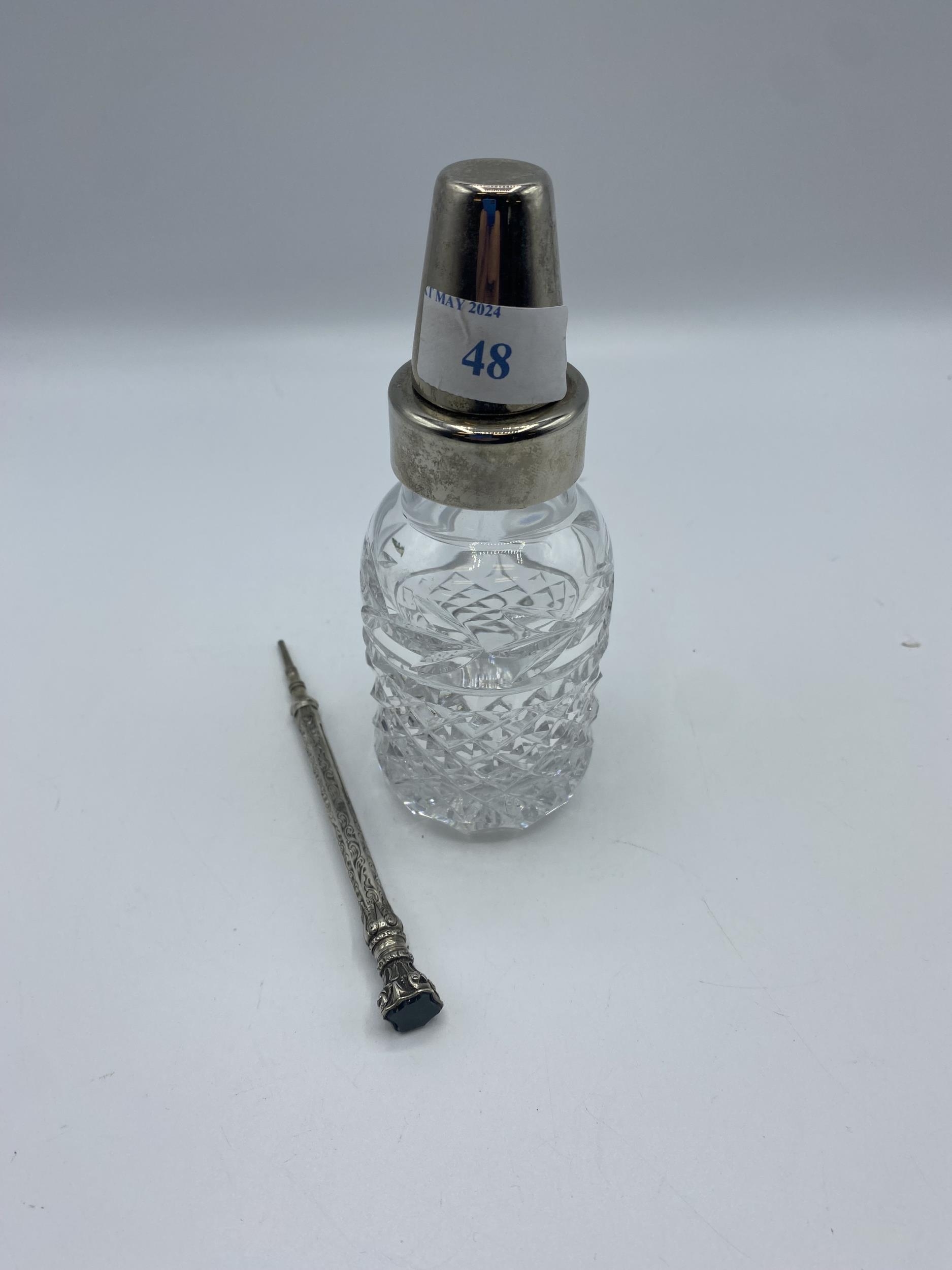 A cut glass and white metal baby bottle together with a white metal propelling pencil with - Image 5 of 5