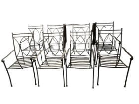 8 Neptune style iron garden arm chairs, (one with some rust). All with some general wear.