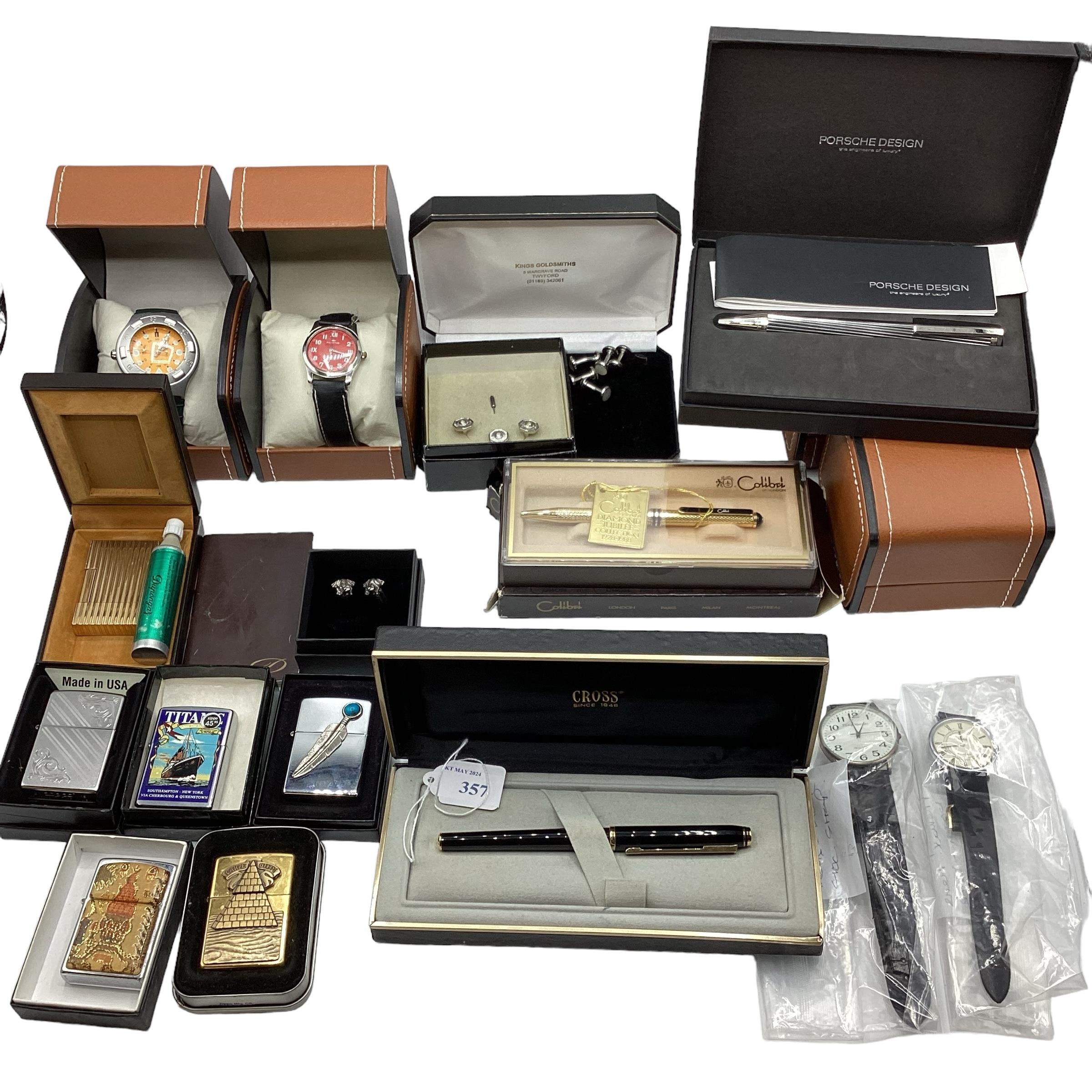 A collection of boxed High Street fashion watches , zippo lighters fountain pens etc.