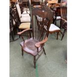 A bobbin turned rocking chair with reeded seat (some losses); and an oak Windsor style high backed